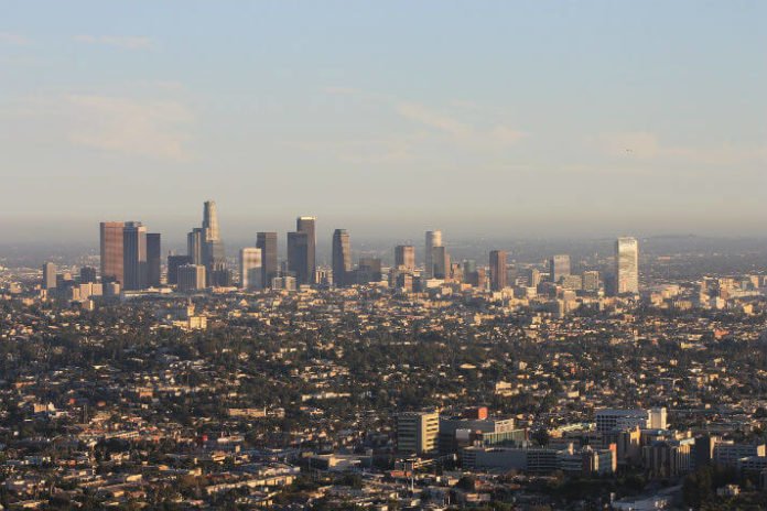 Skyscape Skyslide discounted rate see San Gabriel Mountains downtown LA aerial view