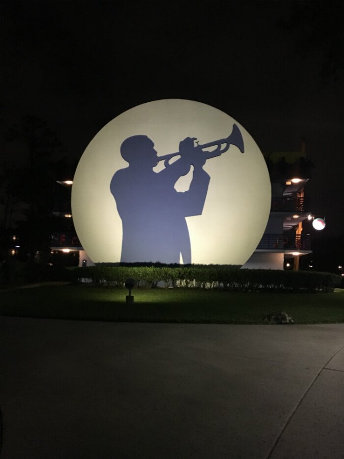 silhouette of trumpet player outside Disney's All Star Music Resort