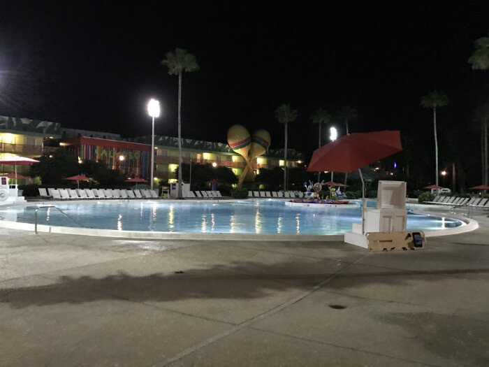 pool, buildings and Three Amigos statue at All Star Music Resort