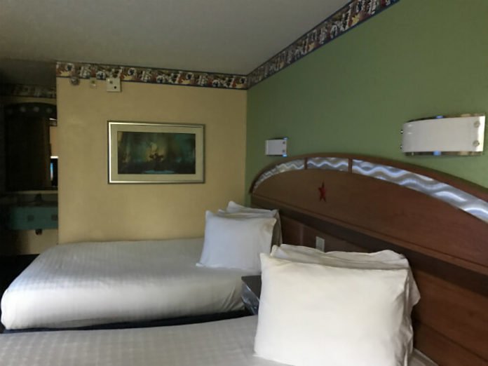 All Star Music hotel room with picture of Mickey conducting the orchestra