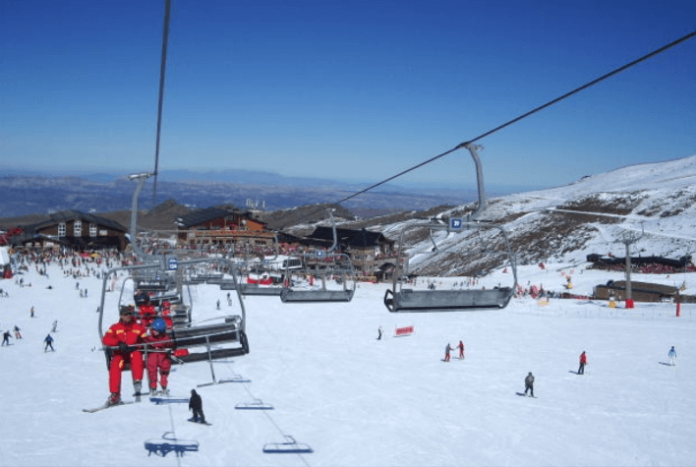 Granada Spain Sierra Nevada hotel close to slopes for cross country downhill skiing & snowboarding discount price