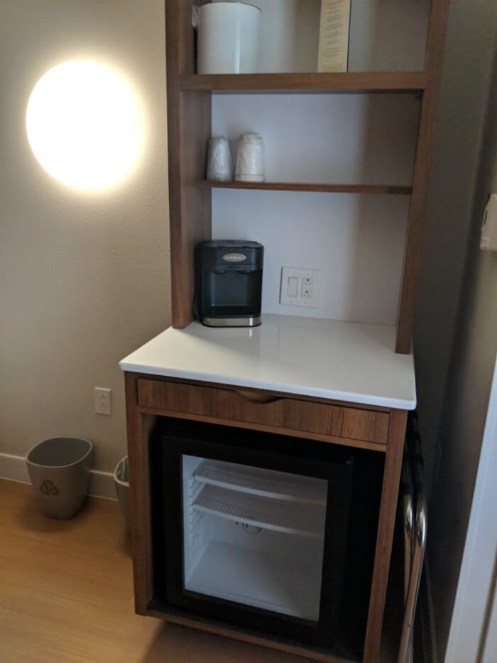 Pop Century hotel room refrigerator, shelves, charging outlets at Disney World resort