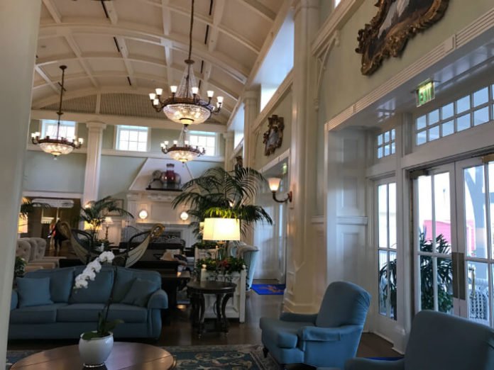 Beautiful chandeliers & comfortable furniture in Disney's Boardwalk Inn lobby