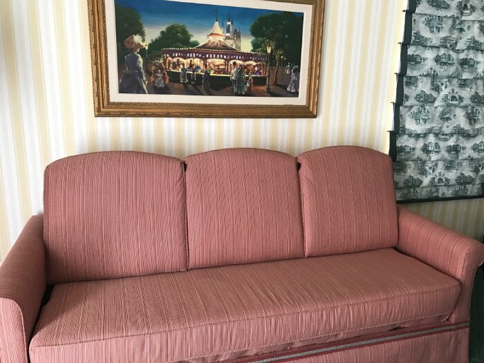 Beautiful sofa in spacious accommodations at Disney's Boardwalk Inn Orlando