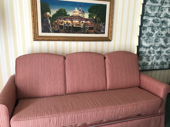 Beautiful sofa in spacious accommodations at Disney's Boardwalk Inn Orlando