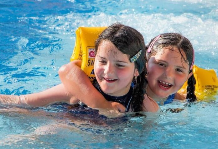 Save 55% on family fun package at Branson Missouri resort with water park fun zone