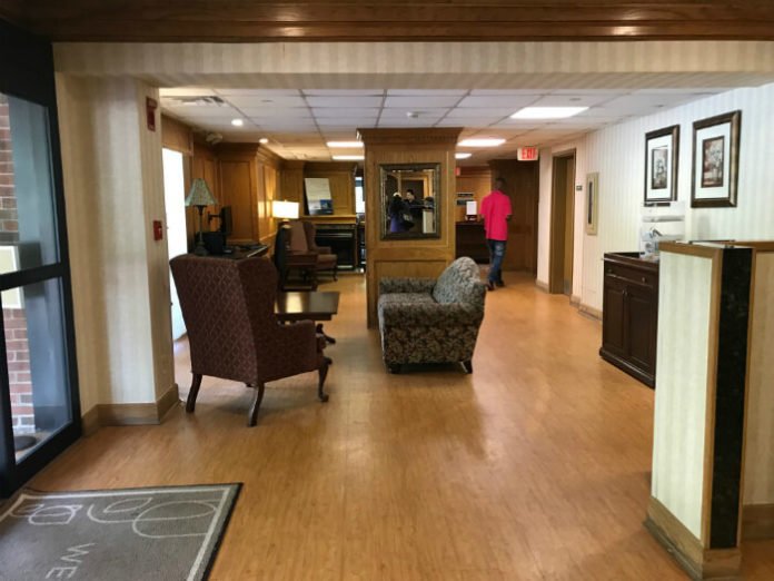 hotel lobby with nice chairs & sofa at Country Inn & Suites Williamsburg East Busch Gardens