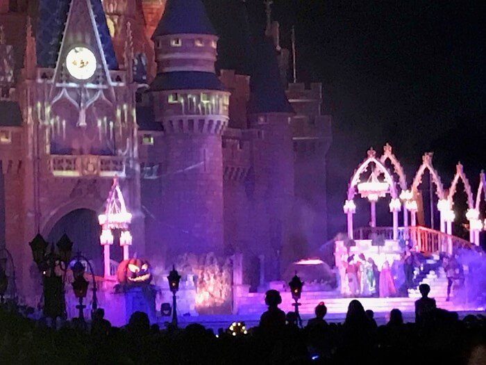 Hocus Pocus Villain Spelltacular in front of Castle in Magic Kingdom