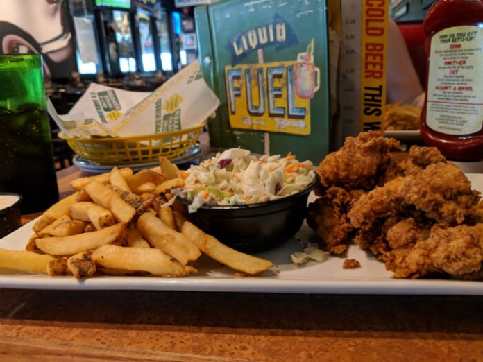 chicken fingers, fries and cole slaw inside Quaker Steak and Lube in Sandusky Ohio