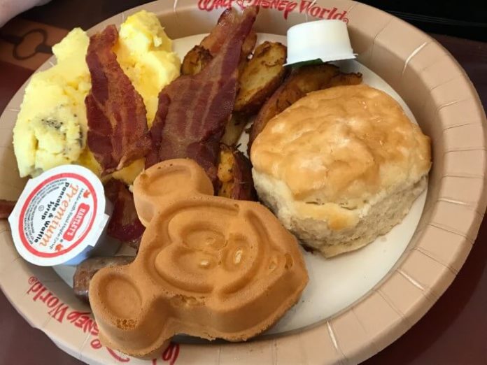 breakfast with Mickey waffle, biscuit, bacon & eggs at Saratoga Springs food court at Disney World