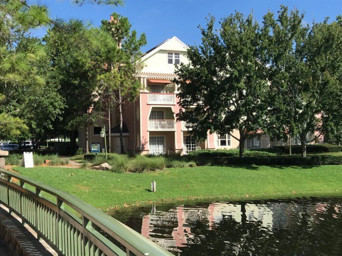 exterior of Saratoga Springs hotel building and lake