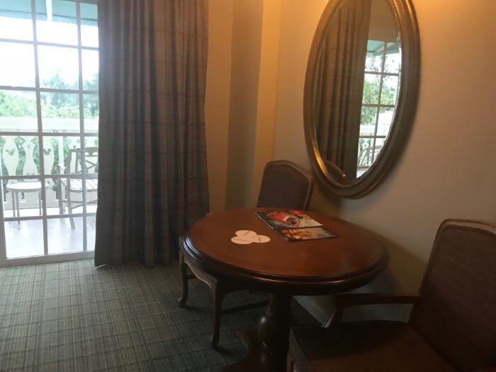 Disney's Saratoga Springs Resort hotel room table, chairs, mirror, window & curtains