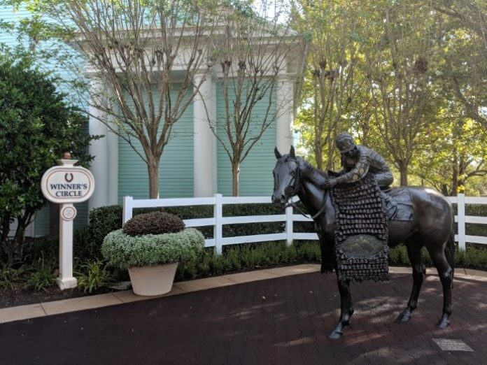 10 Tips for Staying at Disney’s Saratoga Springs Winner's Circle and horse and jockey statue outside Disney's Saratoga Springs Resort & Spa