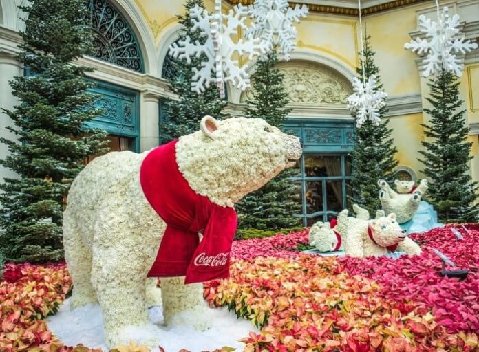 Enjoy Christmas Celebration with holiday music fountain show & decorations in Las Vegas Nevada at Bellagio