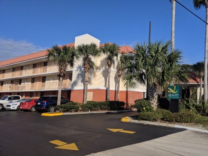 Quality Inn St. Augustine Beach has beautiful palm trees outside