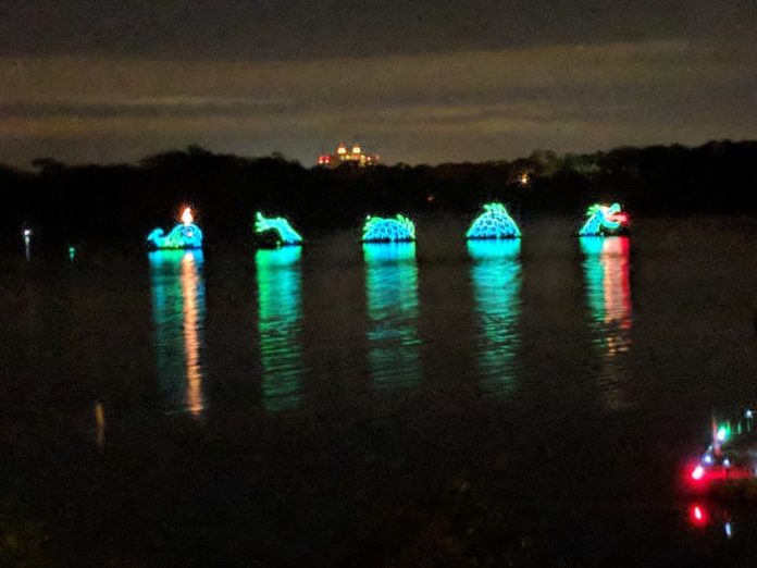 Walt Disney World's Electric Water Pageant can be seen from Bay Lake Tower balconies