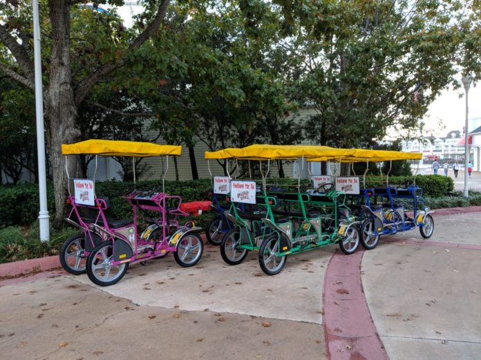 Rent a surrey bike for family fun at Boardwalk hotel at Walt Disney World Resort in Orlando Florida