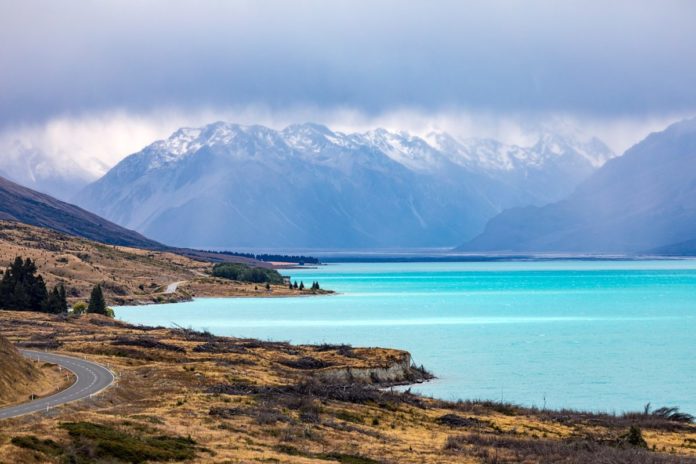 An image of the turquoise Lake Pukaki in New Zealand. Find out how to get a low rate for a nearby hotel