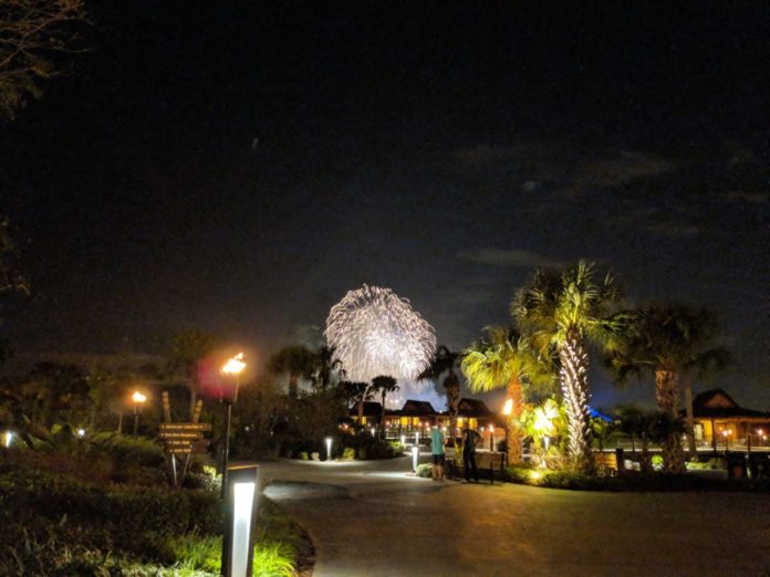 A picture of a view of the Magic Kingdom fireworks from Disney's Polynesian Resort, a big perk of staying at Polynesian.