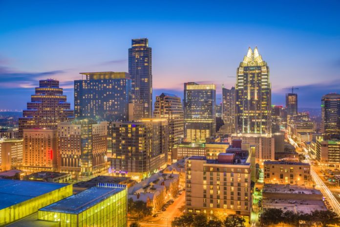 Austin, Texas, USA skyline at dusk. Find out how to get deals on Austin hotels.