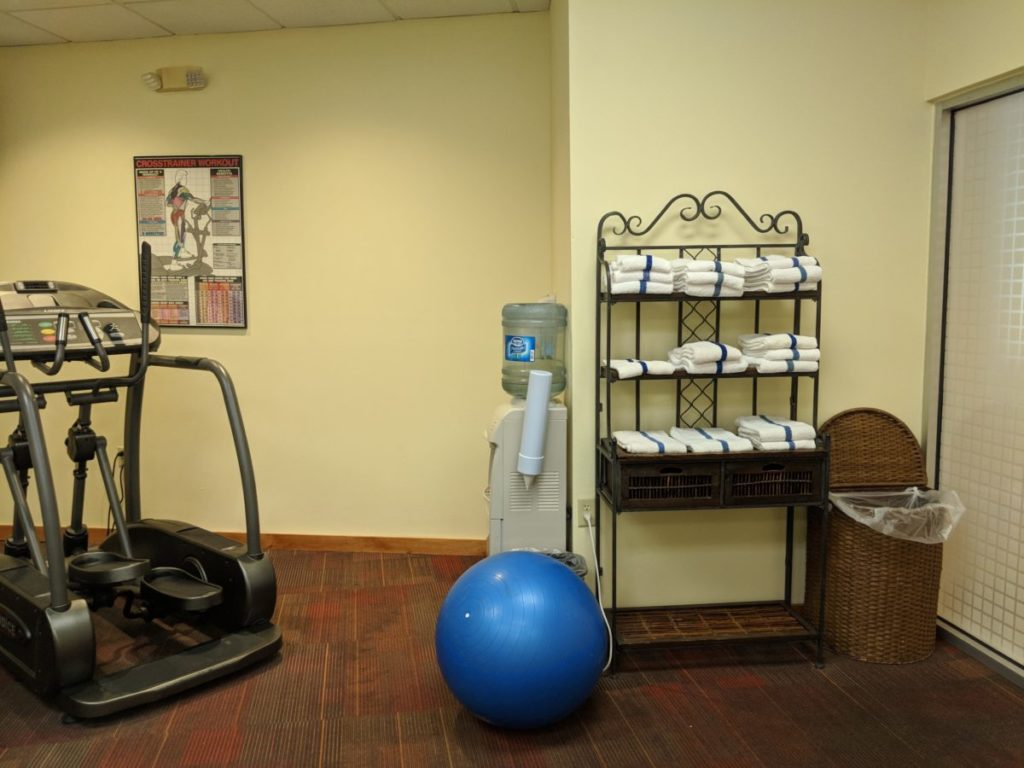 A picture of fitness & yoga equipment available at the workout room at Best Western at Disney World in Orlando Florida