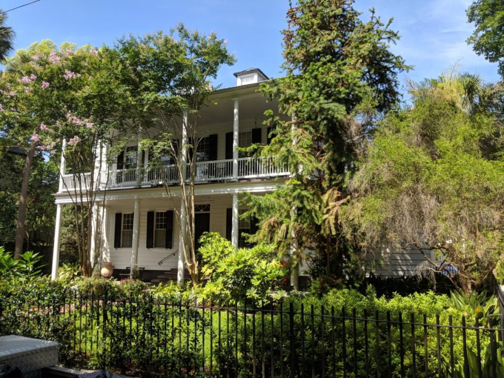 A beautiful home & trees that you'll see during the Charleston Historic District horse & carriage tour.