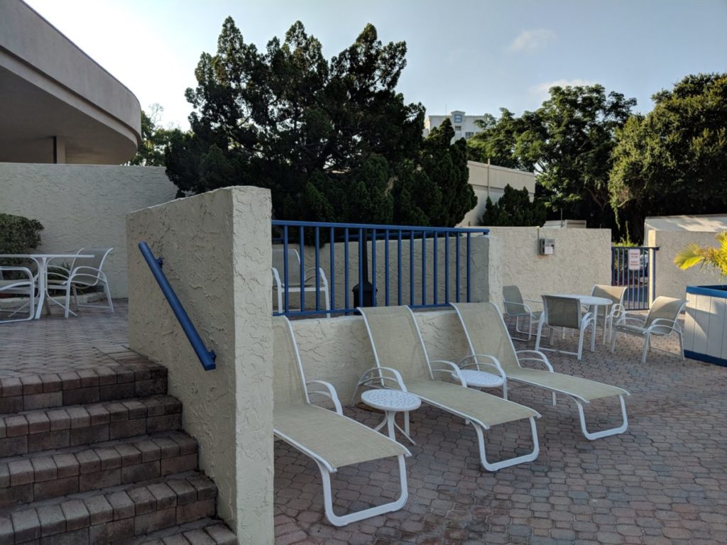 Parents can relax while their kids swim in the pool at Best Western Lake Buena Vista at Walt Disney World Resort in Orlando Florida