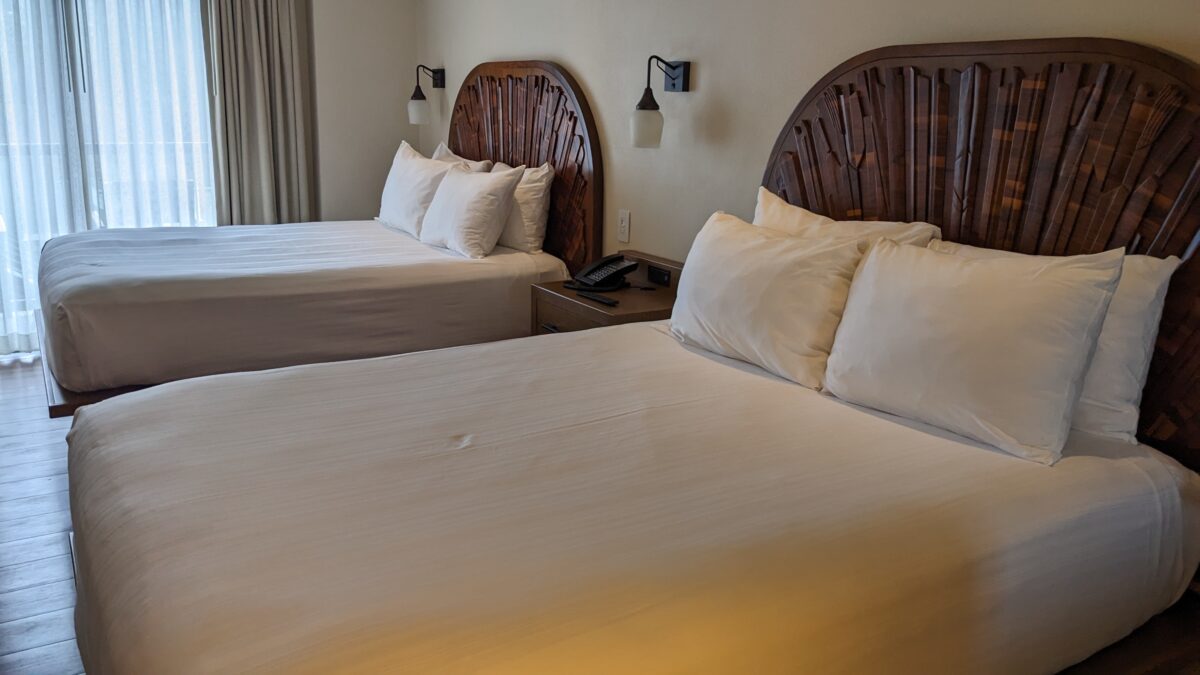A picture of queen beds at Disney's Wilderness Lodge's two-bedroom villas at Copper Creek