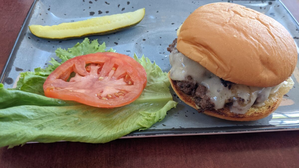 Museum Cafe in Williamsburg, Virginia has a great burger with lots of topping and your choice of cheese